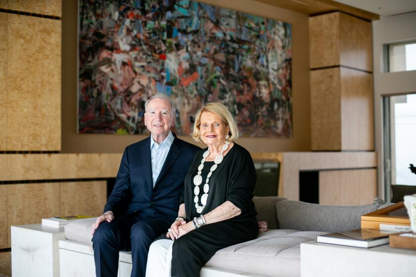 Irwin M. Jacobs, the founding chairman and CEO Emeritus of Qualcomm, and his wife Joan Jacobs, pose for a portrait in their home on August 7, 2019 in San Diego, California.