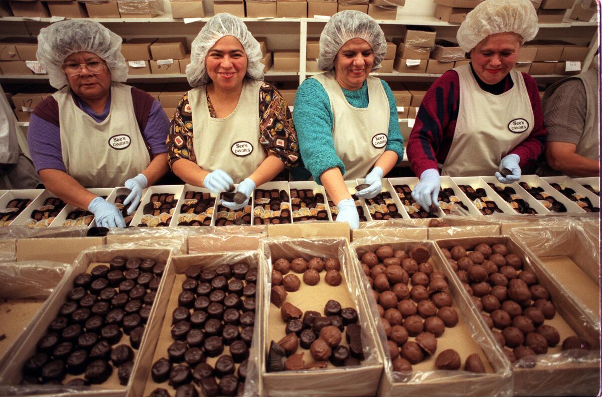 FO.See's#14.IS.12/18.Women on the packing line at See's candy factory on La Cienega