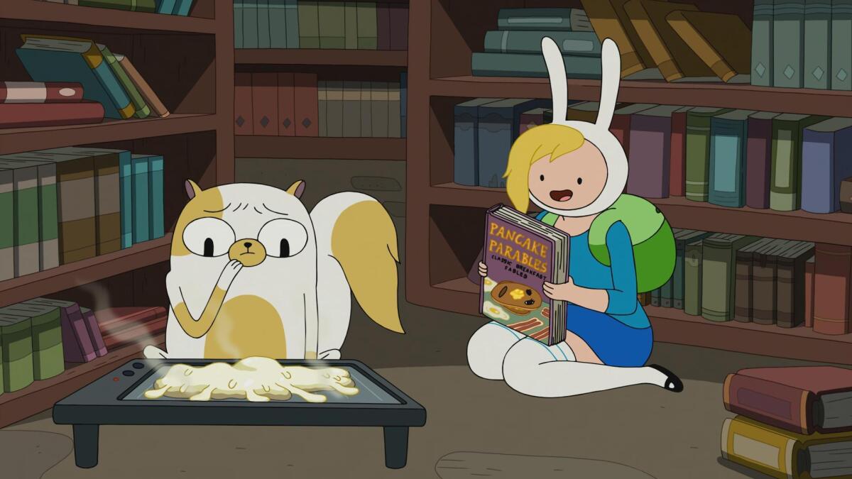 A scene from an episode of "Adventure Time" titled "Five Short Tables," featuring Cake the Cat and Fionna the Human.