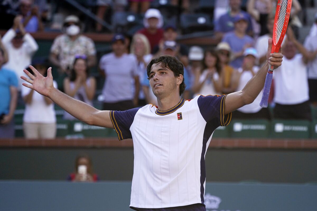 Taylor Fritz, of the United States, reacts after defeating Alexander Zverev, of Germany, at the BNP Paribas Open tennis tournament Friday, Oct. 15, 2021, in Indian Wells, Calif. (AP Photo/Mark J. Terrill)