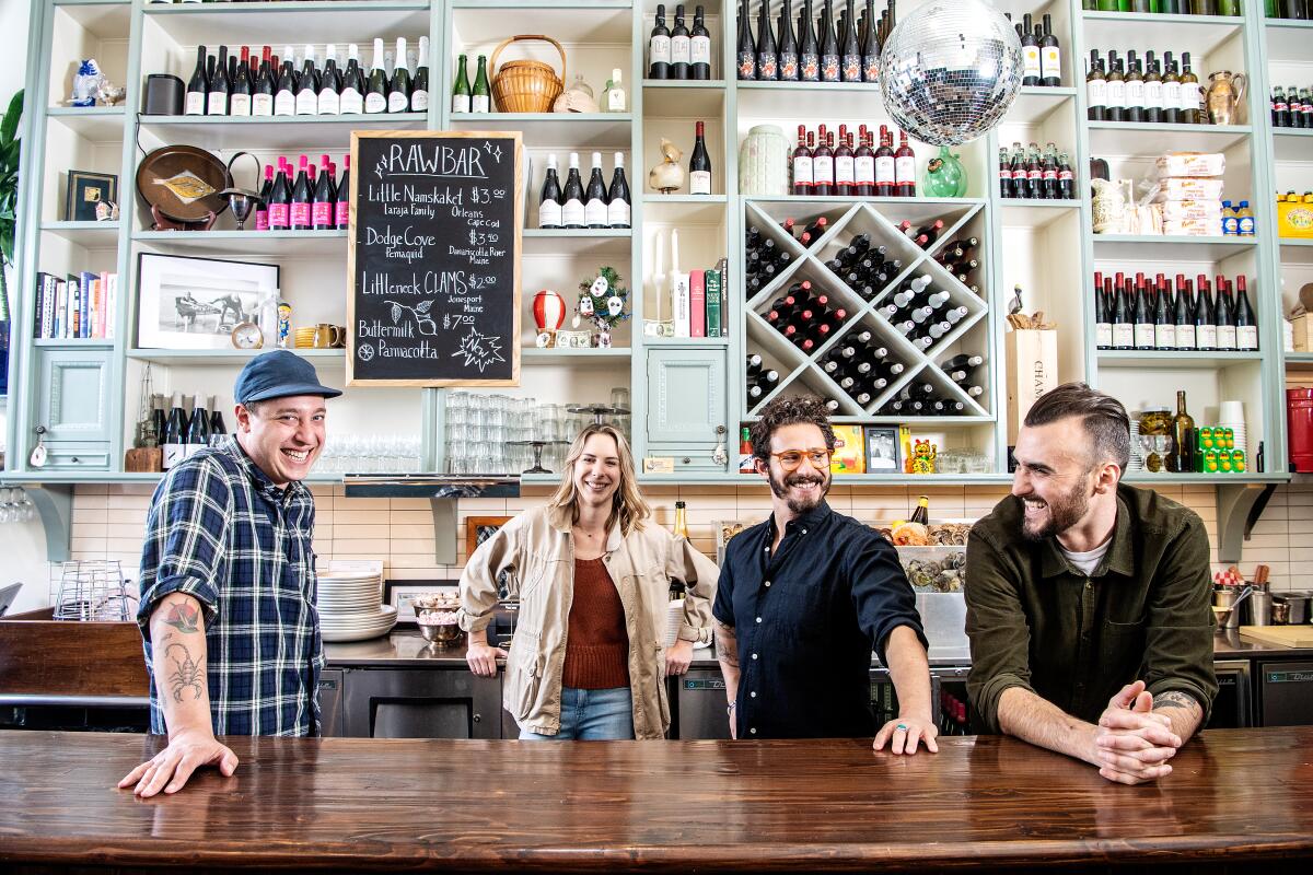 Found Oyster co-owners Adam Weisblatt and Holly Fox of Last Word Hospitality, Ari Kolender and general manager Joe Laraja.