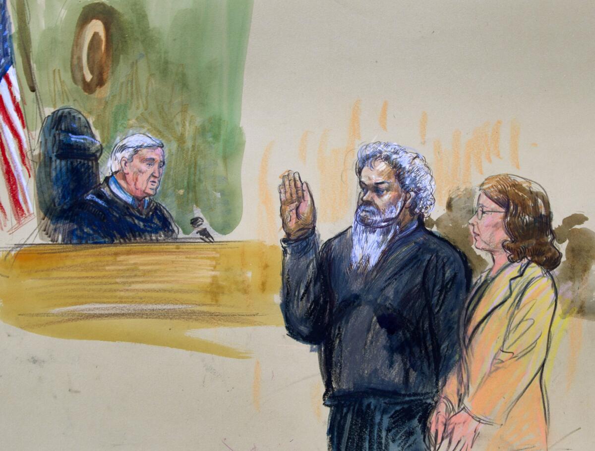 This artist's rendering shows Judge John Facciola swearing in Ahmed Abu Khatallah, wearing a headphone, as his attorney Michelle Peterson looks on during a hearing at the federal U.S. District Court in Washington.
