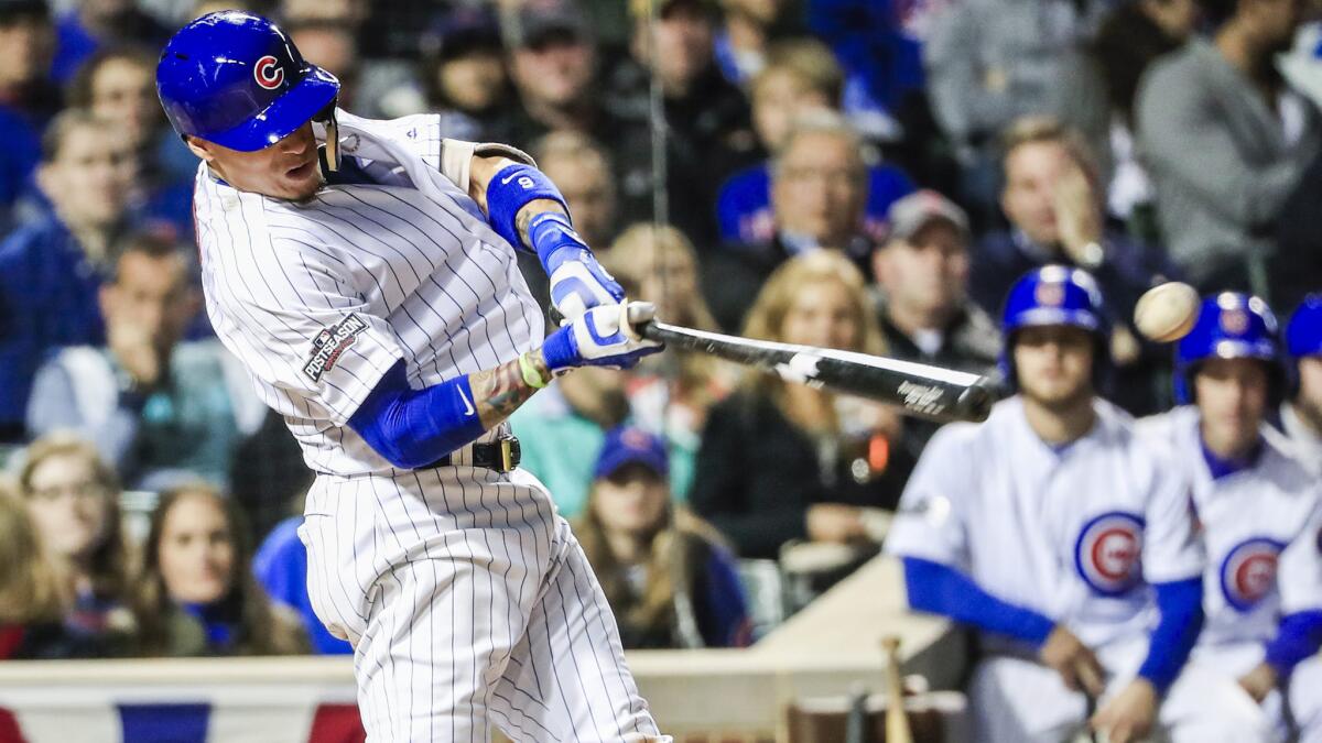 Cubs second baseman Javier Baez, singling in the fifth inning against the Giants, had the game-winning homer in the eighth inning Friday night.