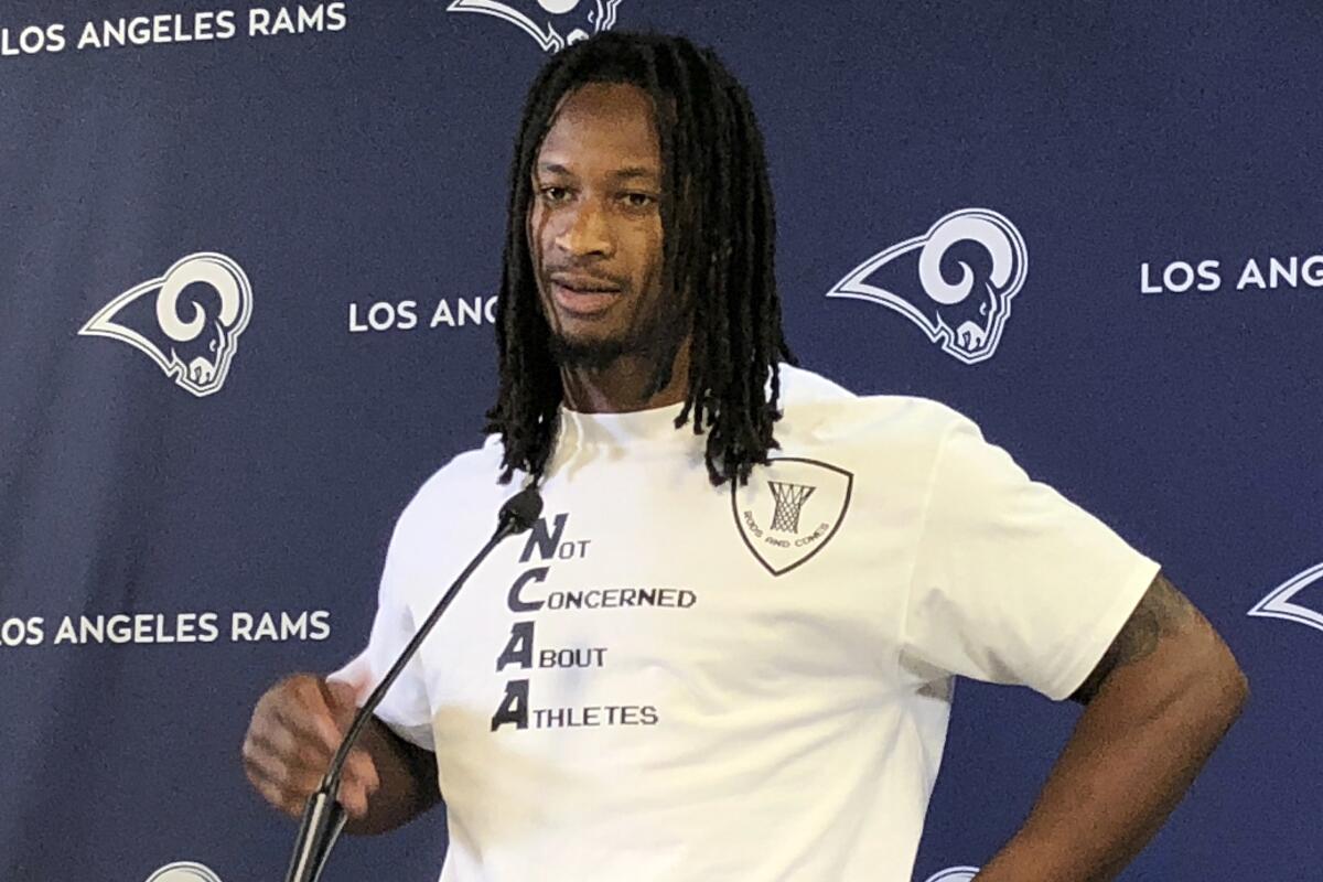 Rams running back Todd Gurley wears a shirt reading "Not Concerned About Athletes" to his weekly news conference at the team's training complex in Thousand Oaks on Thursday. 