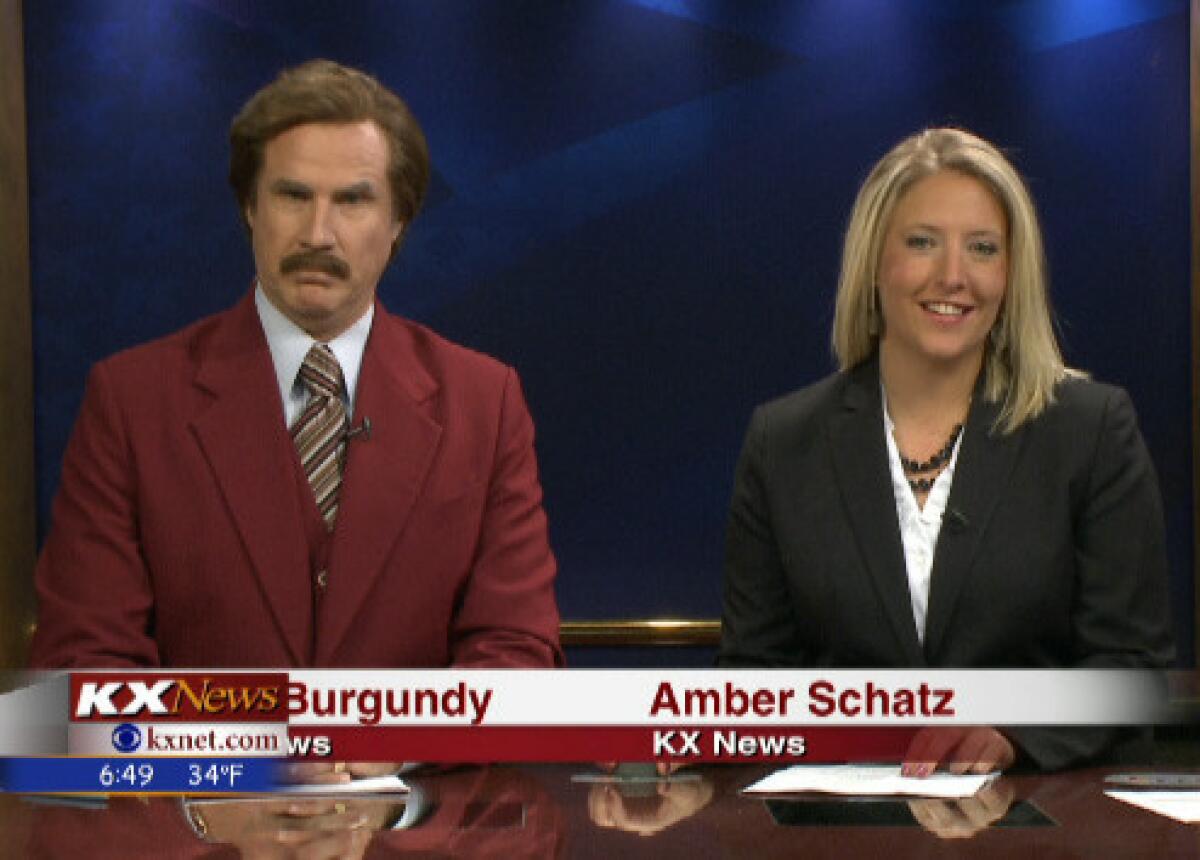 In this screen grab provided by television station KXMB in Bismarck, N.D., Will Ferrell, as his "Anchorman" character Ron Burgundy, co-anchors the evening news with Amber Schatz.