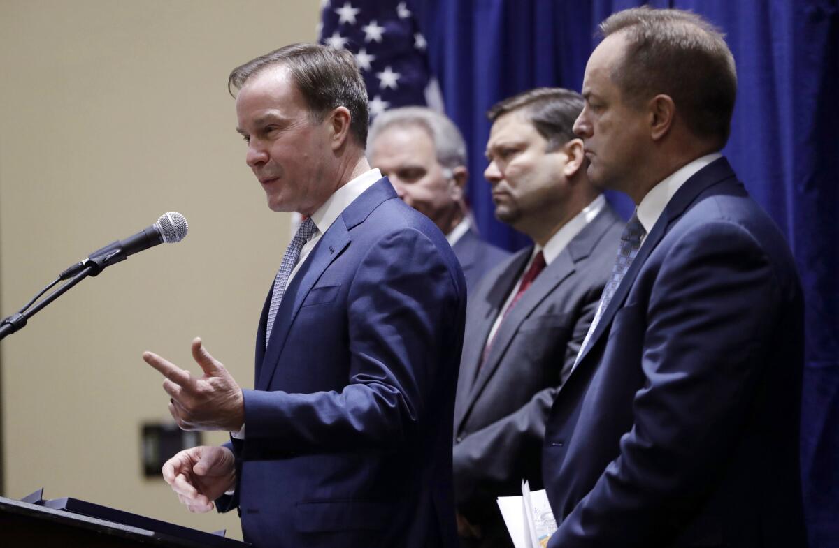 Michigan Atty. Gen. Bill Schuette announces charges against two former state emergency managers in connection with the Flint water crisis.