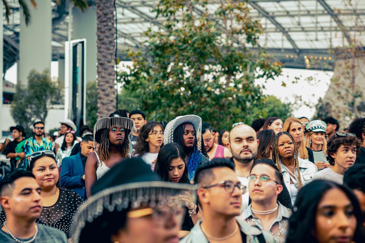 Fans stand in line to purchase merch at Beyonce's Renaissance World Tour on Friday.