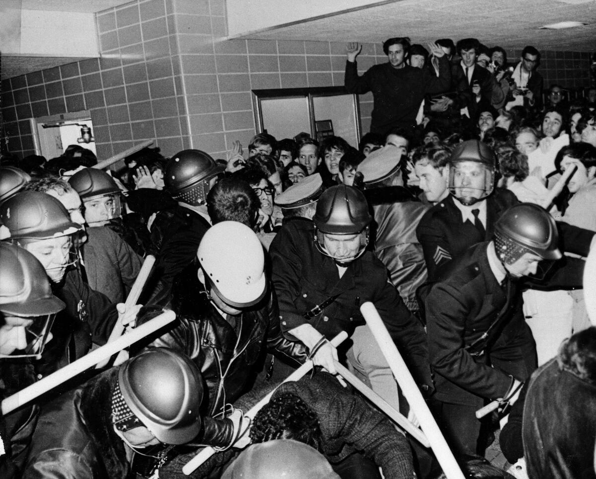 Police used tear gas and night sticks to break up anti-Vietnam War demonstrations at the University of Wisconsin in 1967.