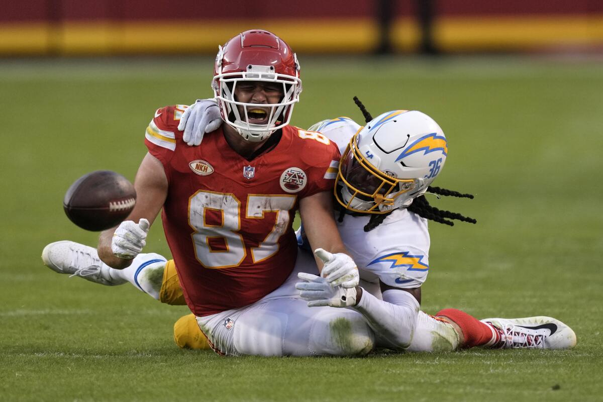 Chargers cornerback Ja'Sir Taylor prevents a completion to Chiefs tight end Travis Kelce (87) in October. 