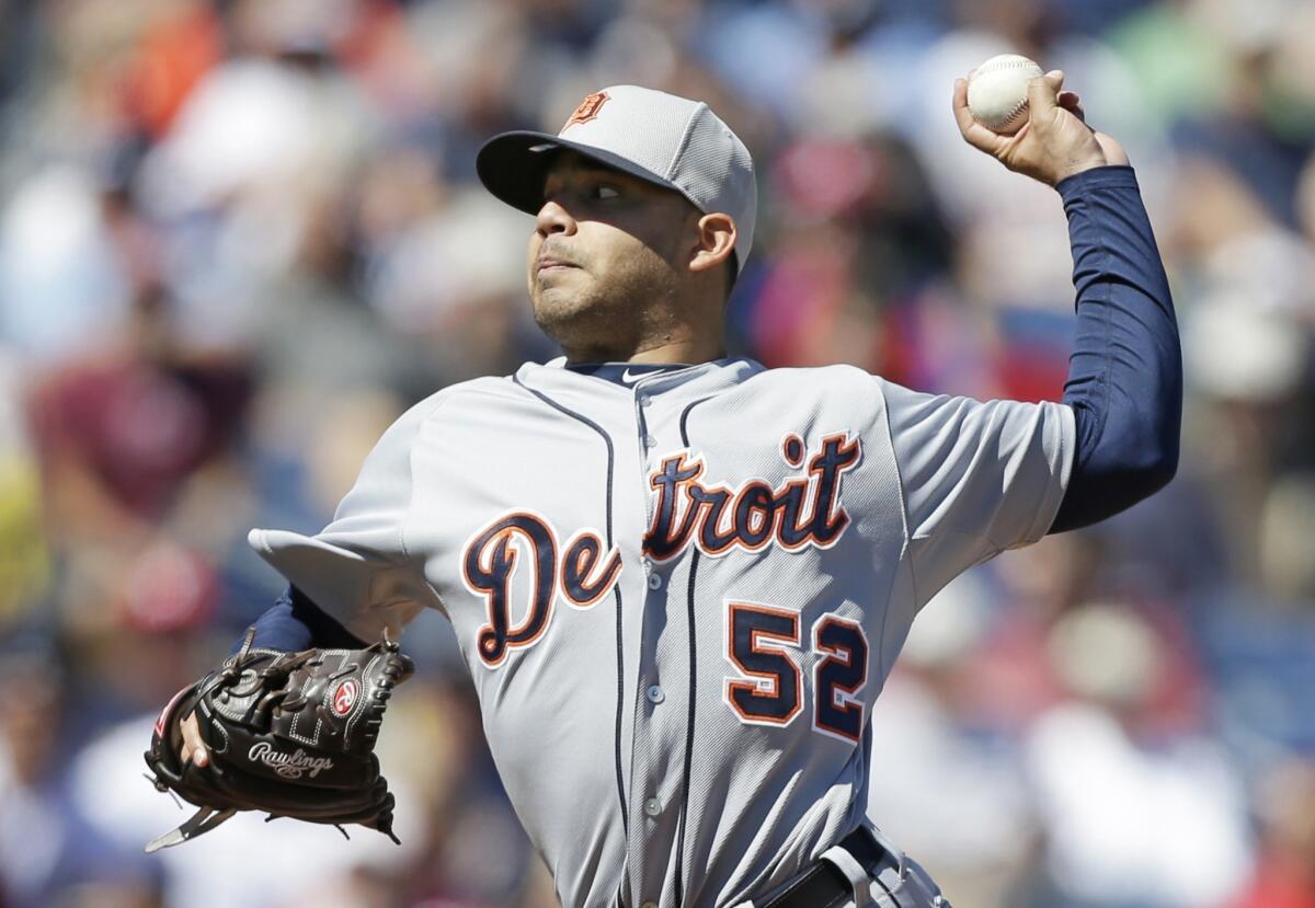 The Angels acquired Detroit Tigers pitcher Jose Alvarez in exchange for shortstop Andrew Romine as part of a trade Friday.