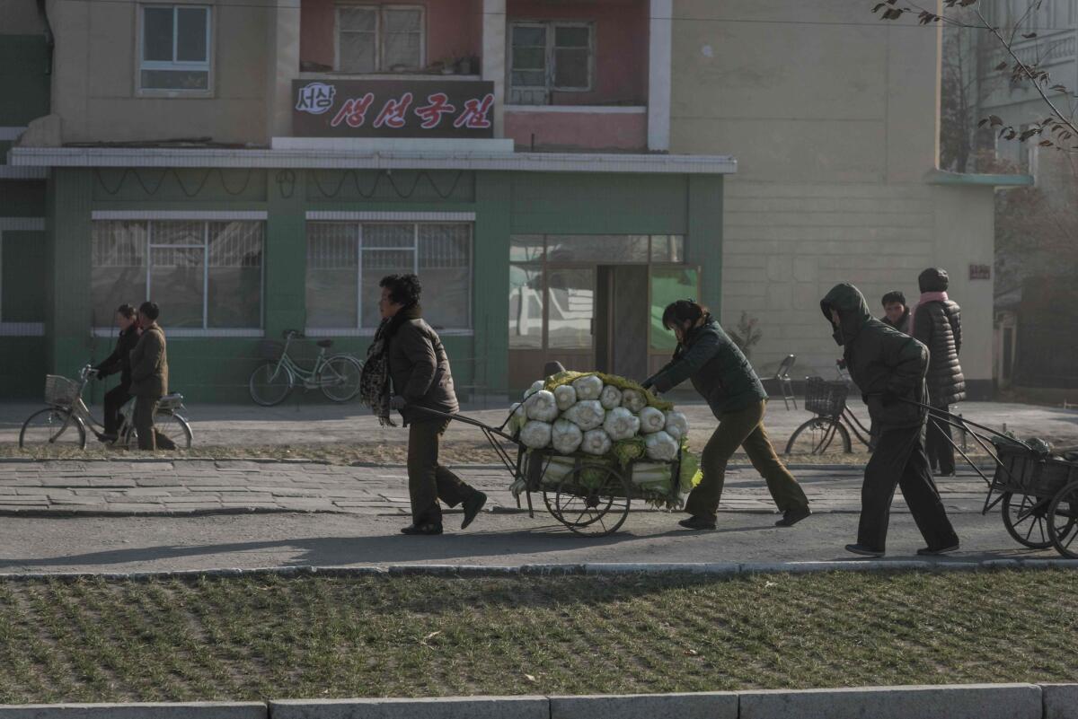 North Koreans push a cart carrying cabbage in Hamhung, on the northeast coast, in November 2017. The United Nations said North Korea recorded its worst harvest for more than a decade in 2018.