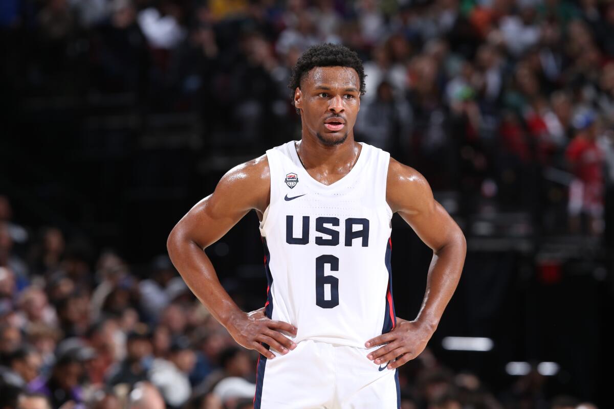 Bronny James stands on the court playing for Team USA during the 2023 Nike Hoop Summit.