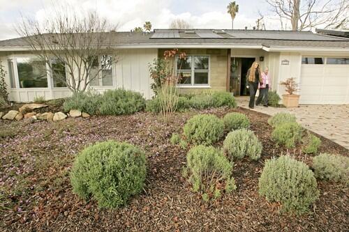 Harriet Burke and her daughter Kathy Scheidemen are shown outside their tract home in Goleta, which underwent an environmentally sensitive remodel to the tune of $300,000. Pardon Our Dust: Goleta home's green remodel gives mother and daughter space