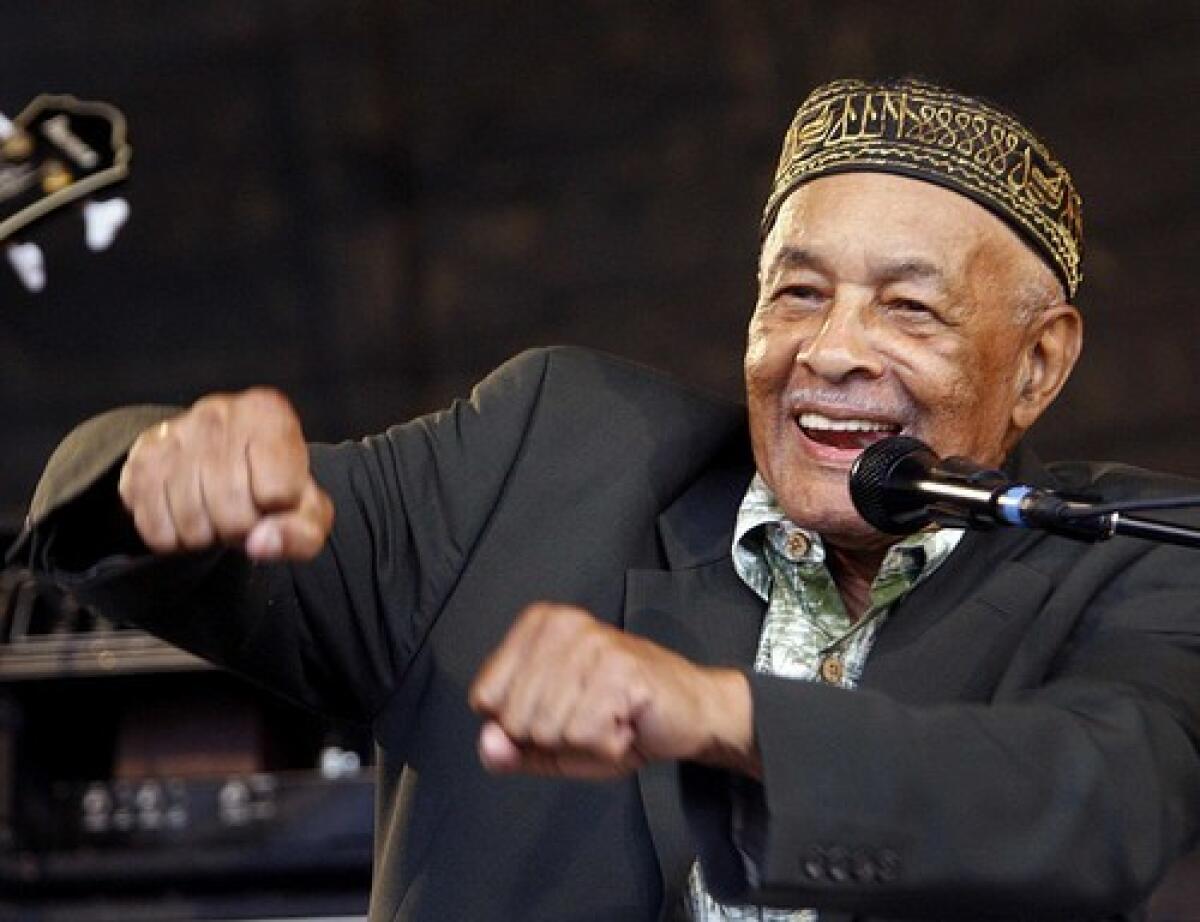 Blues musician Eddie Bo performs at the New Orleans Jazz and Heritage Festival in 2008. Bo, whose career spanned more than five decades, worked with musicians such as Irma Thomas, Robert Parker and Art Neville.