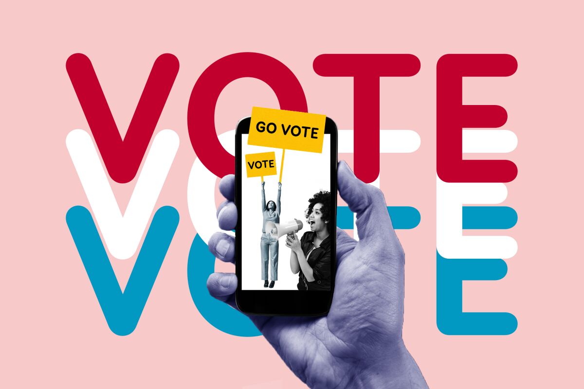 A hand holds a phone showing a picture of a woman with a sign that says Go Vote and another woman shouting into a megaphone.