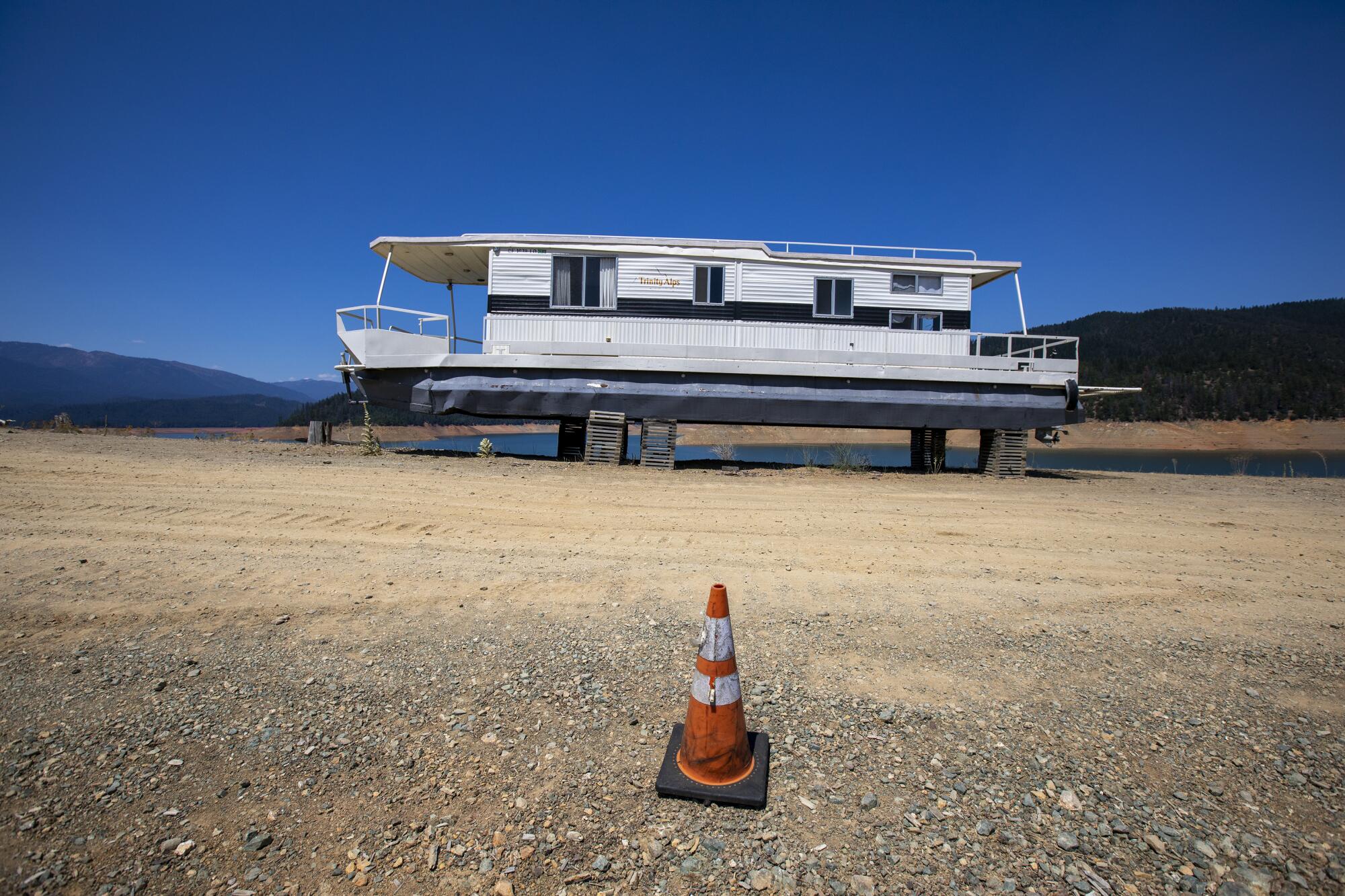 A houseboat is out of the water for repairs at Trinity Lake.