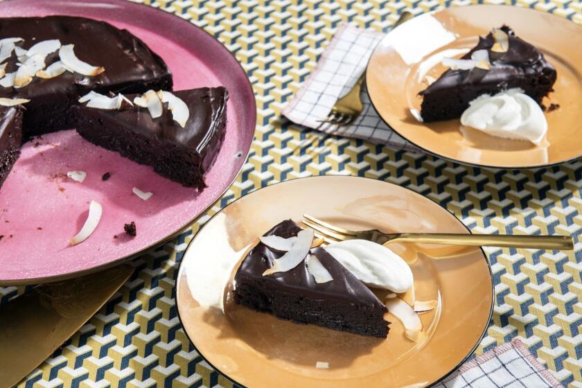 ONE TIME USE - QUEENS, NEW YORK - Apr 2, 2019 - Making Passover recipes by Adeena Sussman and various LA Chefs. MOMED'S FLOURLESS CHOCOLATE CAKE by Chef Bradley Tuck.