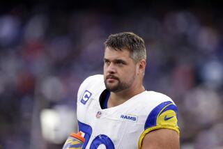 Los Angeles Rams offensive tackle Rob Havenstein (79) looks on against the New York Giants.