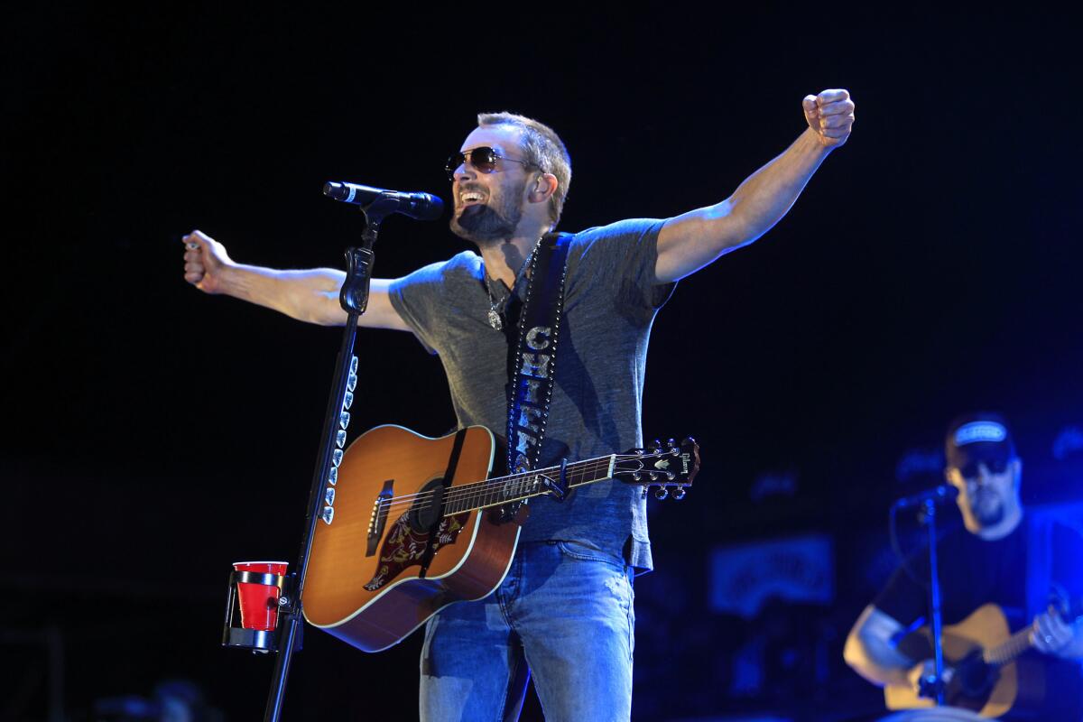 Country singer Eric Church, performing at the Stagecoach festival in 2014, is nominated for five CMA Awards.