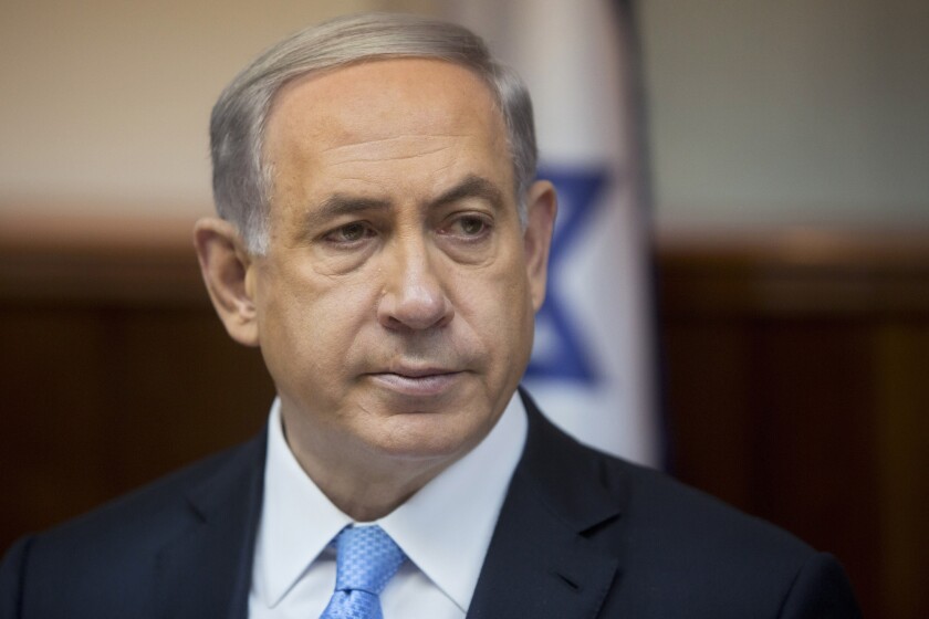 Israeli Prime Minister Benjamin Netanyahu attends the weekly cabinet meeting in his Jerusalem office on February 8, 2015.