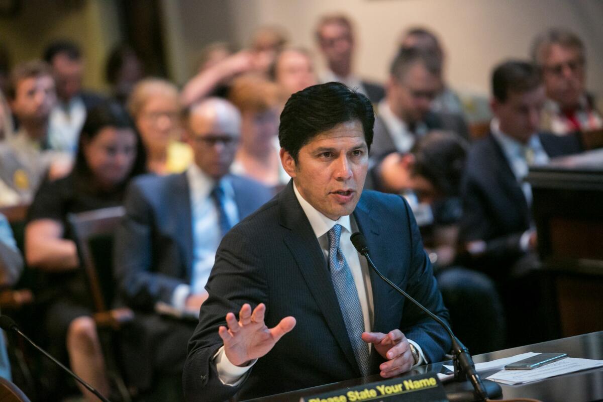Californina Senate leader Kevin de León (D-Los Angeles) speaks about climate change legislation during a committee hearing in the Capitol on Sept. 10.