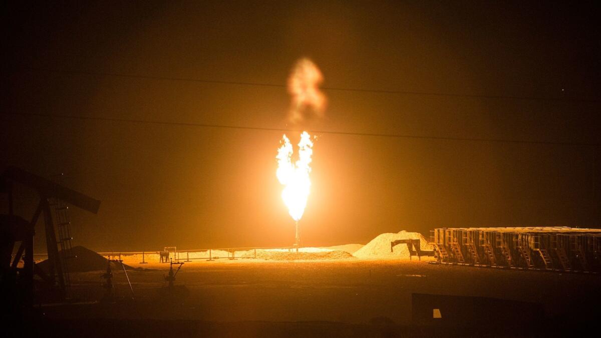 A gas flare at an oil well site in North Dakota in 2013.