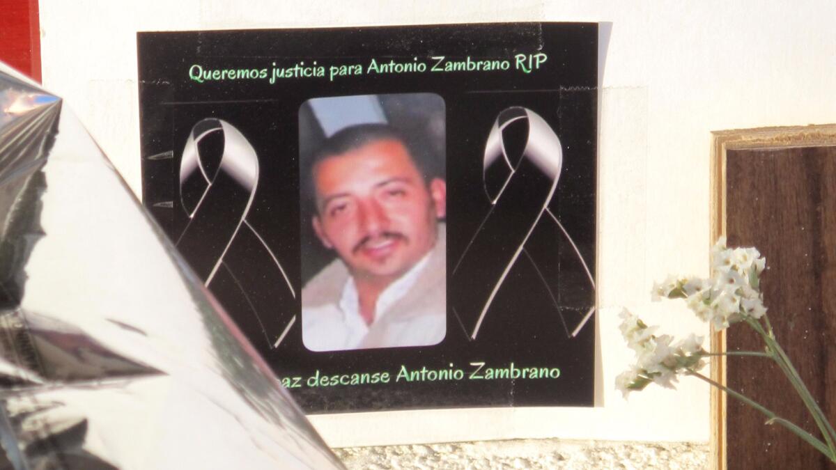 A photo of Antonio Zambrano-Montes is displayed at a memorial in Pasco, Wash.