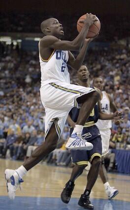 UCLA guard Darren Collison, drives to the hoop against Michigan in the second half at Pauly Pavillion.