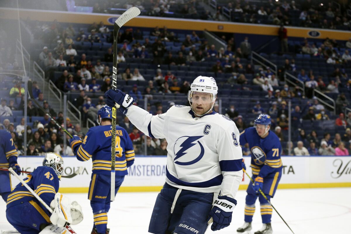 Tampa Bay Lightning center Steven Stamkos (91) celebrates his goal during the second period of an NHL hockey game against the Buffalo Sabres on Tuesday, Jan. 11, 2022, in Buffalo, N.Y. (AP Photo/Joshua Bessex)
