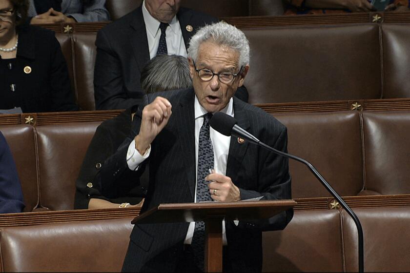 Rep. Alan Lowenthal, D-Calif., speaks as the House of Representatives debates the articles of impeachment against President Donald Trump at the Capitol in Washington, Wednesday, Dec. 18, 2019. (House Television via AP)