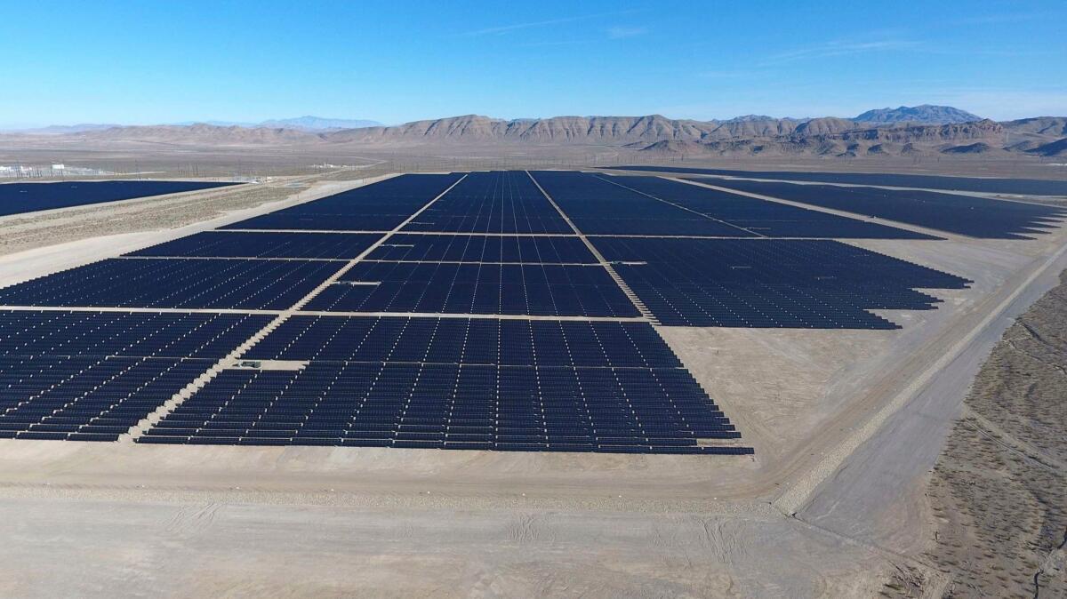 Solar arrays line the desert floor of the Dry Lake Solar Energy Zone as part of the 179-megawatt Switch Station 1 and Switch Station 2 Solar Projects north of Las Vegas that were commissioned on Dec. 11, 2017.