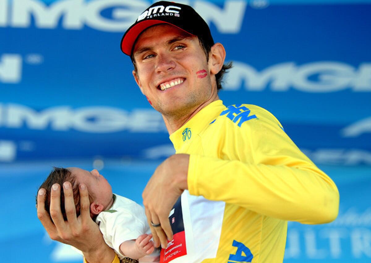 Tejay van Garderen celebrates on the podium with his daughter, Rylan, after winning the Amgen Tour of California on Sunday in Santa Rosa.