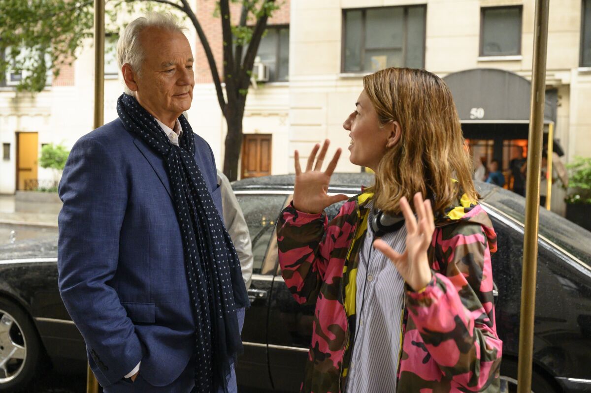 Bill Murray with writer-director Sofia Coppola during the making of "On the Rocks," now streaming on Apple TV+.