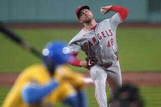 Los Angeles Angels pitcher Reid Detmers delivers during the first inning of the team's baseball.