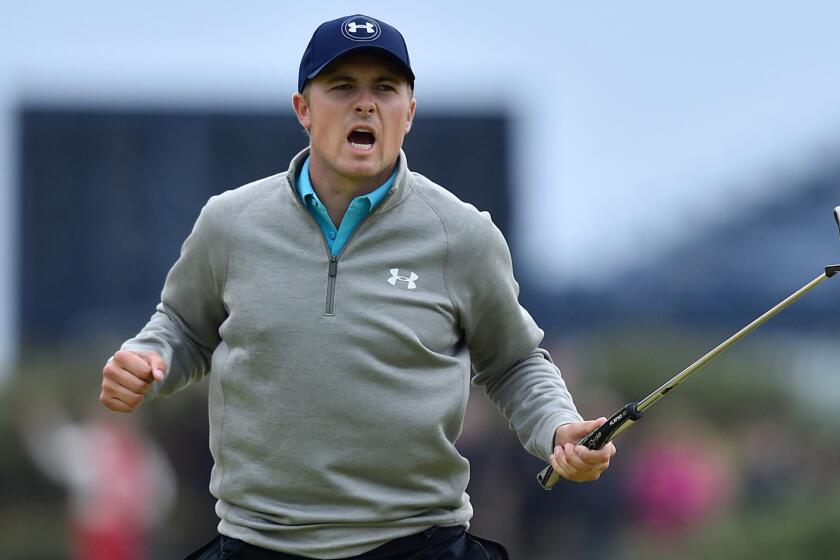 Jordan Spieth celebrates after sinking a birdie on the 16th hole during the final round of the British Open at St. Andrews, Scotland, on Monday.