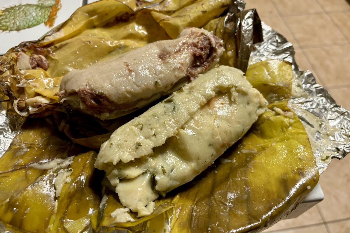 Banana leaf-wrapped tamales from La Original Panaderia El Salvador