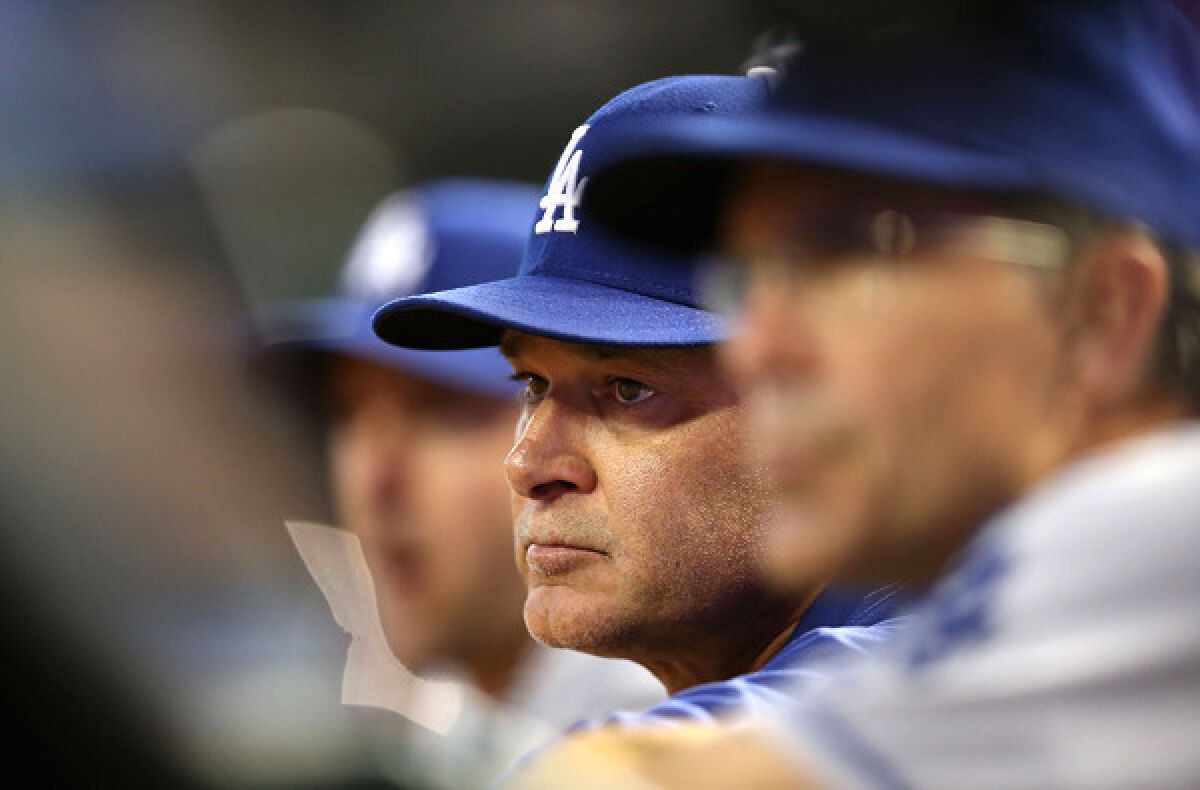 Manager Don Mattingly watches the Dodgers play against the Diamondbacks this weekend, their series between matchups against the San Diego Padres.