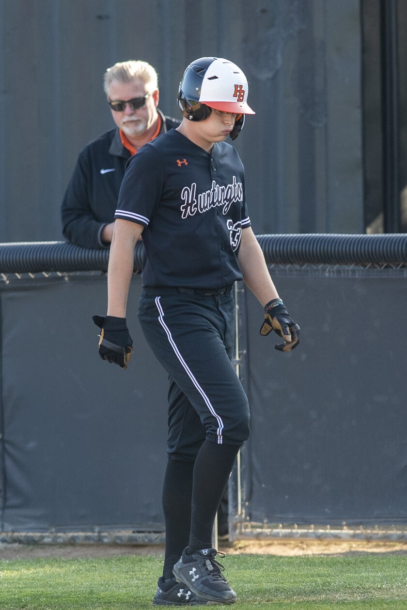 Huntington Beach's Ethan Porter sighs after grounding out for the final out of Tuesday's game.