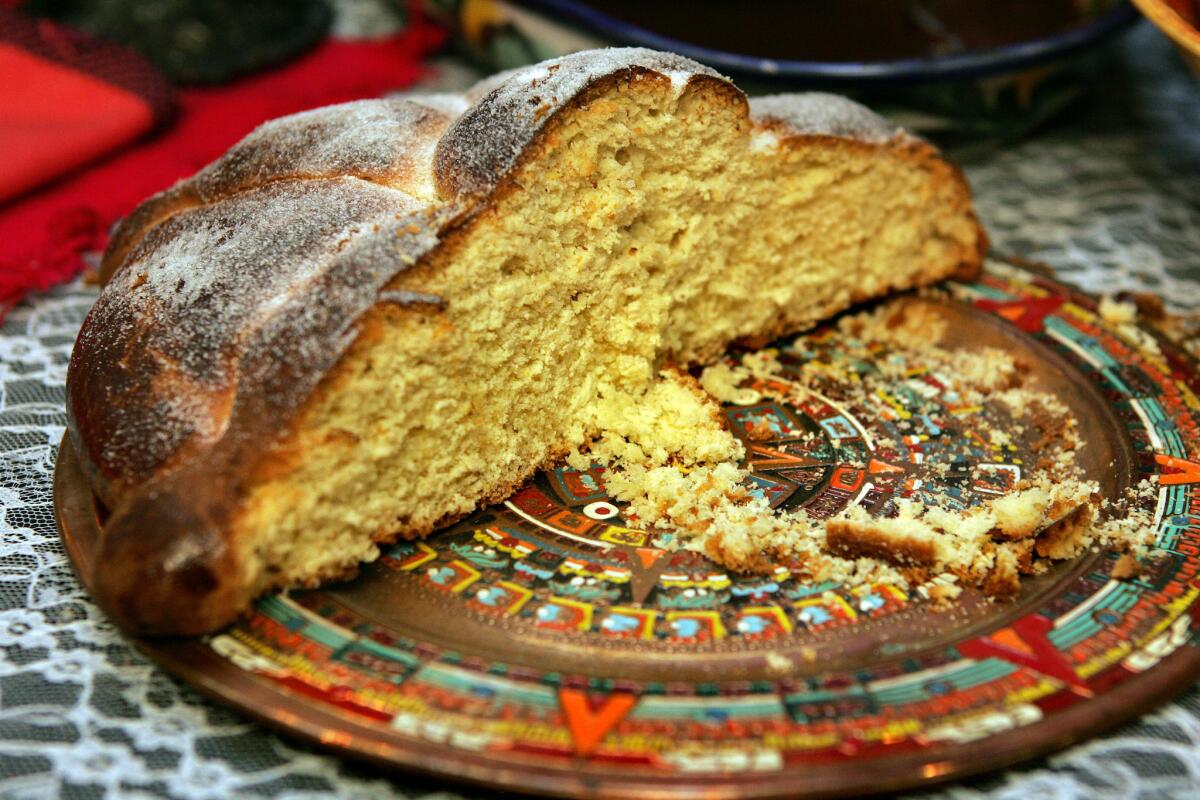 Pan De Muerto on the table at the Day of the Dead feast, hosted by Sandi Romero of Mama's Hot Tamales Café, on October 15, 2008.