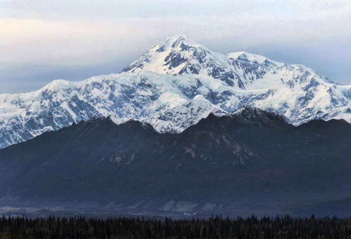 FILE - In this Oct. 1, 2017, photo, North America's tallest peak, Denali, is seen from a turnout in Denali State Park, Alaska. National park rangers in Alaska on Friday, May 6, 2022, resumed an aerial search for the year's first registered climber on North America's tallest peak after he didn't check in with a friend. (AP Photo/Becky Bohrer, File)