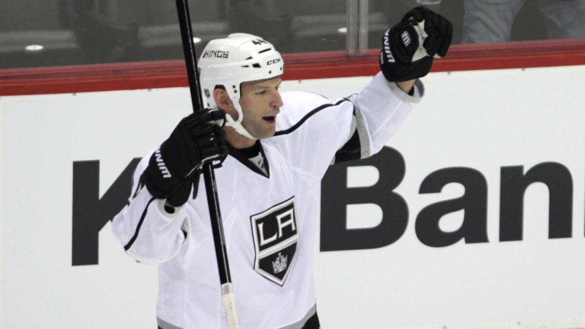 Kings defenseman Robyn Regehr celebrates after scoring against the Colorado Avalanche in February.