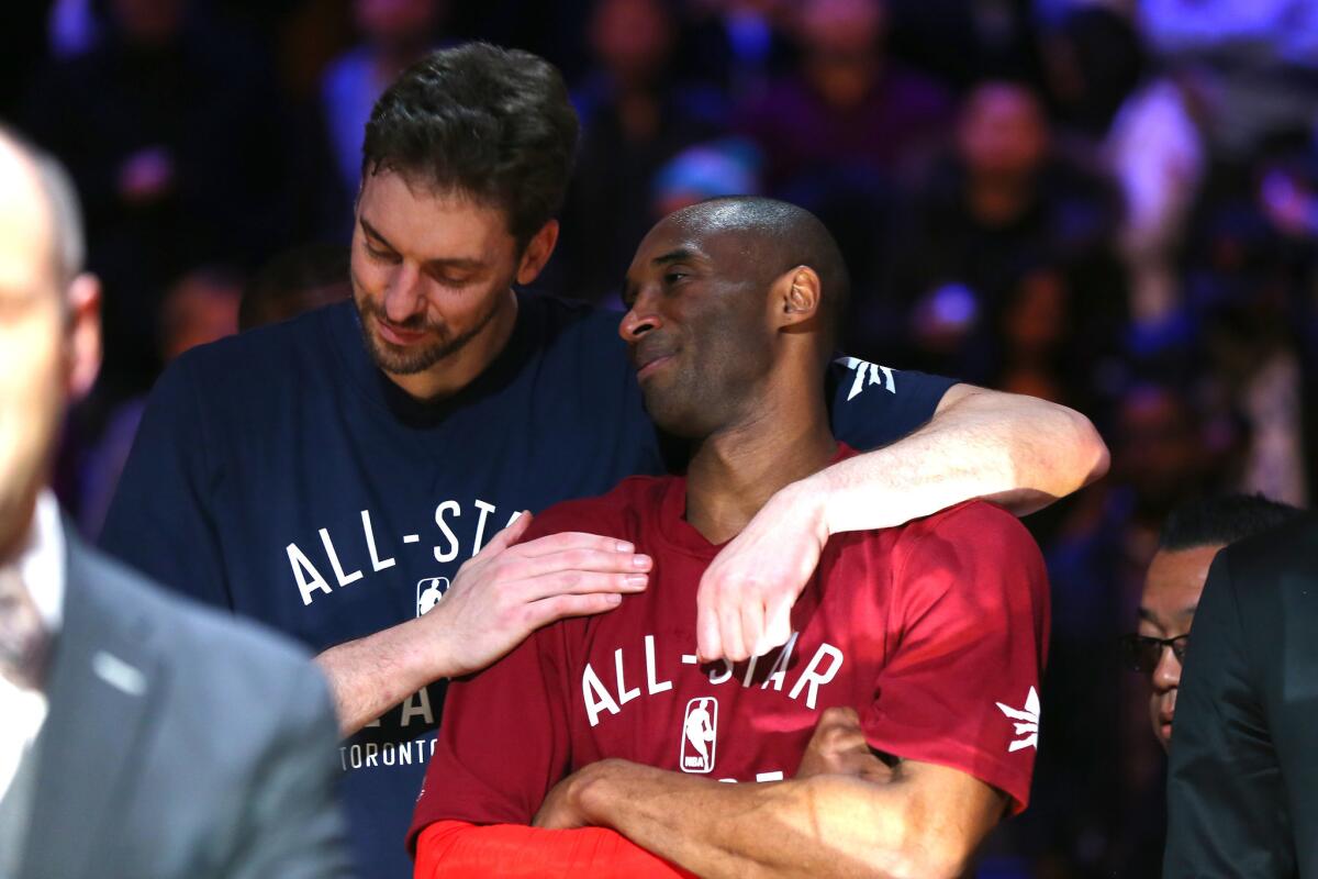 Bulls forward Pau Gasol and Lakers forward Kobe Bryant look on late in the 2016 NBA All-Star game at the Air Canada Centre.