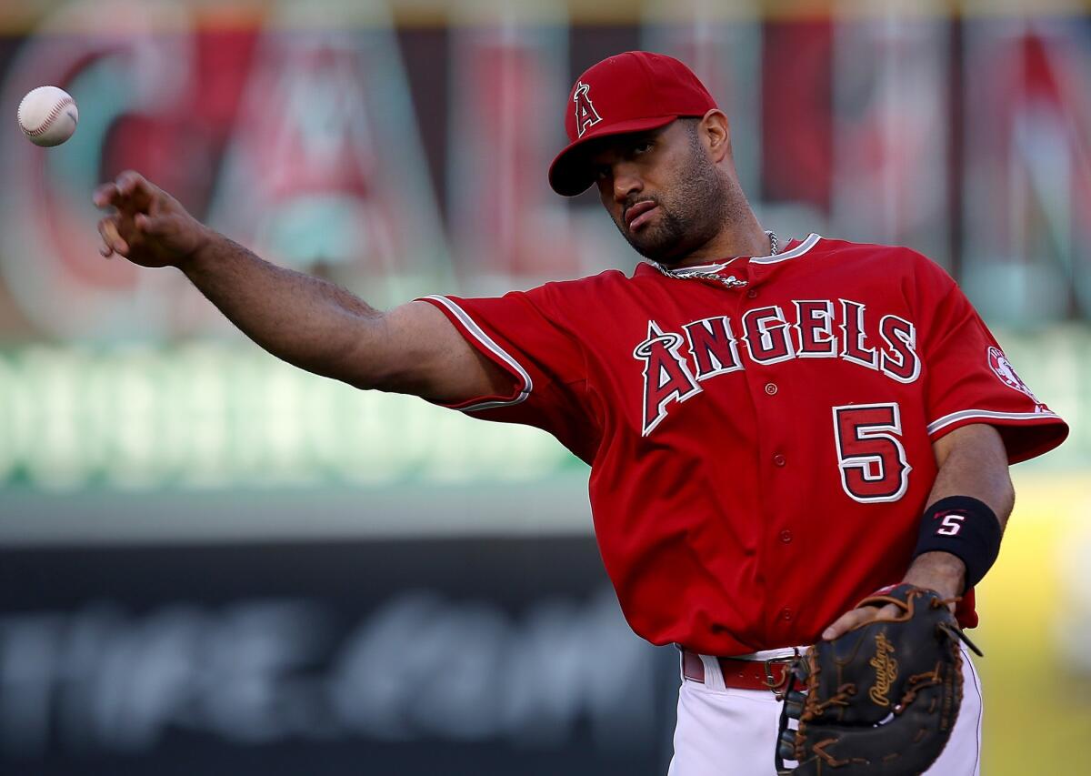 Albert Pujols had a double, two singles, two RBIs and scored twice in the Angels' 6-4 win Thursday over the Minnesota Twins.