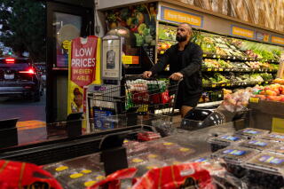 People shop at Ralphs in West Hollywood.