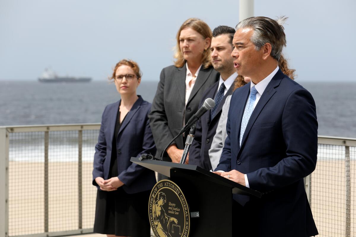 Calif. Attorney General Rob Bonta, right, during a press conference on April 28 in Playa Del Rey. 