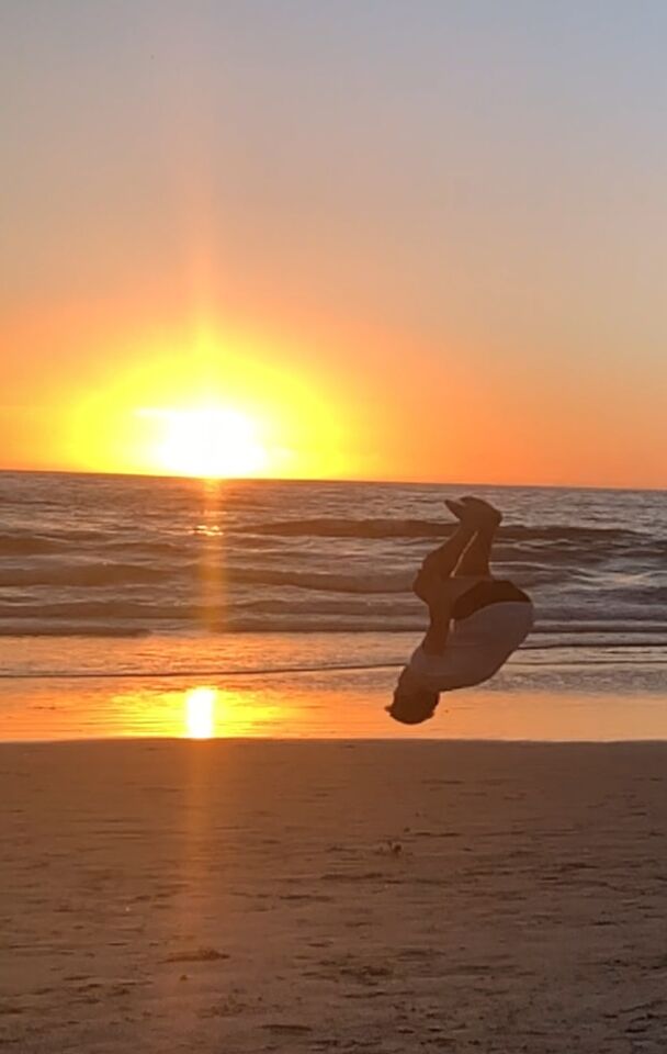 Mark Brown, 17, greets the sunset with a backflip on the beach at the La Jolla Beach & Tennis Club.