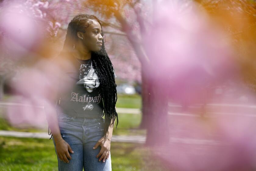 Ashnaelle Bijoux poses on campus, Saturday, April 27, 2024, at Norwich Free Academy in Norwich, Conn. Bijoux, a senior at NFA, has been unable to complete the FAFSA form due to a glitch with the form. Without the form and the financial aid it brings, Bijoux won't be able to pursue her goal of going to Southern Connecticut State University to become a therapist. (AP Photo/Jessica Hill)