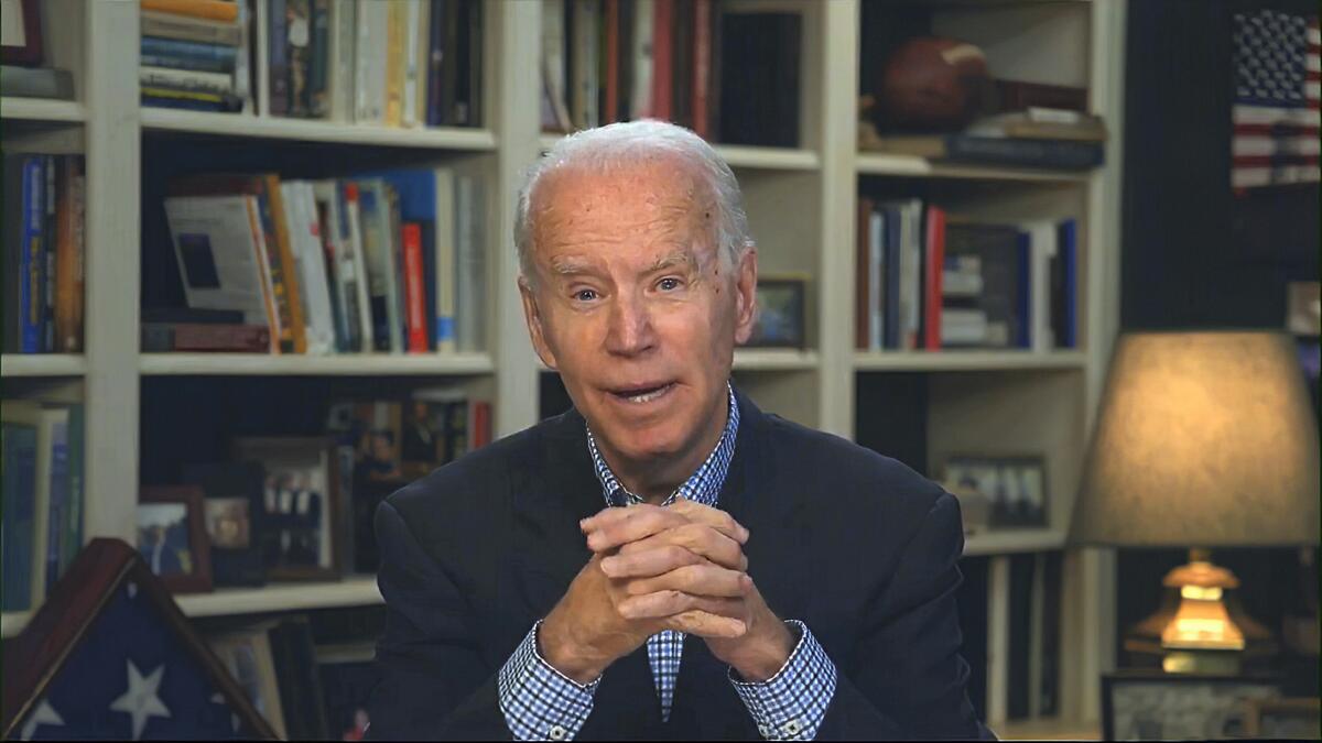 Joe Biden speaks during a virtual news briefing in March.