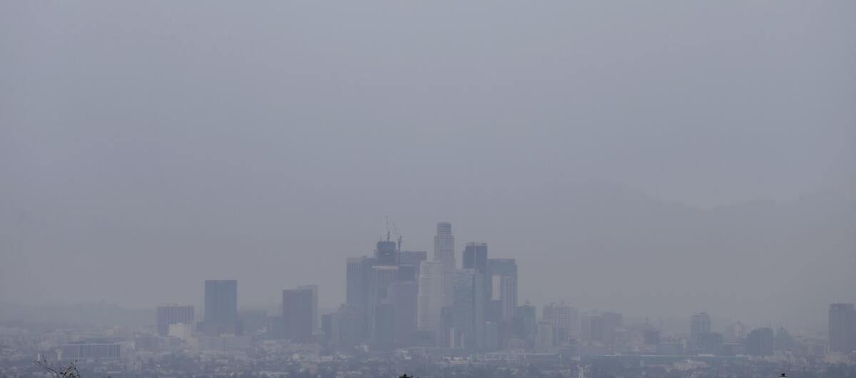 Rain obscures the view of downtown Los Angeles in February. More is expected late this week.