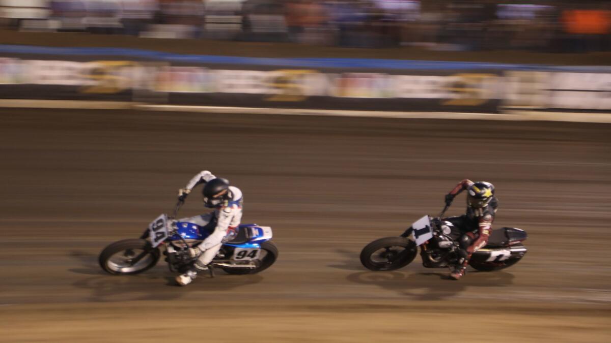 Ryan Wells leads Bryan Smith during the Cycle Gear American Flat Track Finals at Perris Auto Speedway.